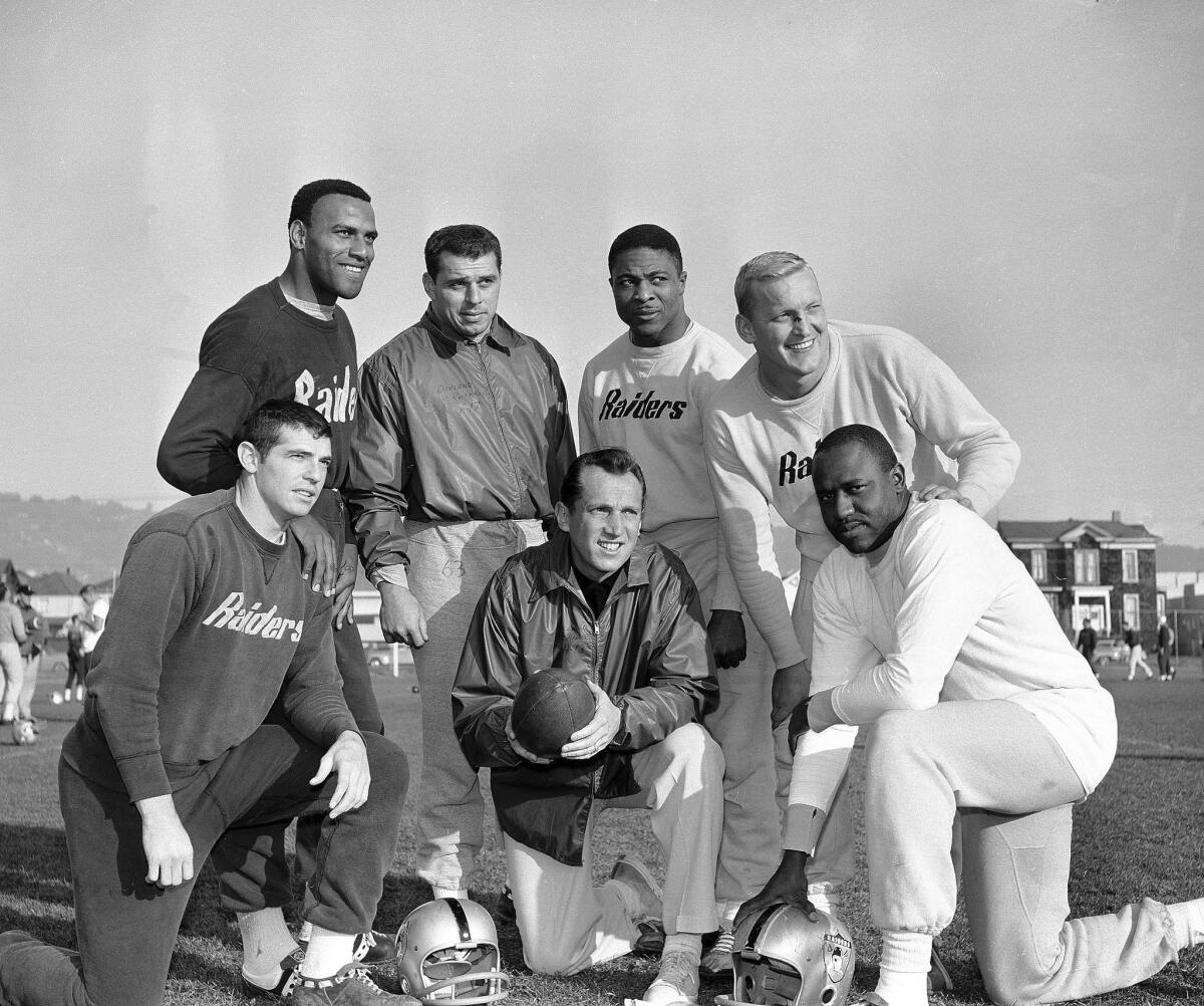 Art Powell is at right in this photo of six Oakland Raiders named to the Associated Press' 1963 AFL All-Star team. At center is Coach Al Davis.
