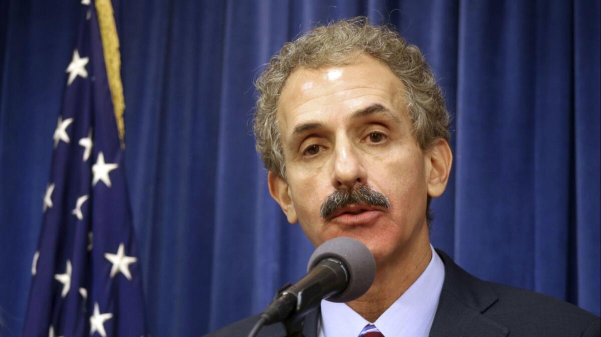 Los Angeles City Atty. Mike Feuer is going after the big tax-preparation companies, accusing them of concealing free services from their customers.