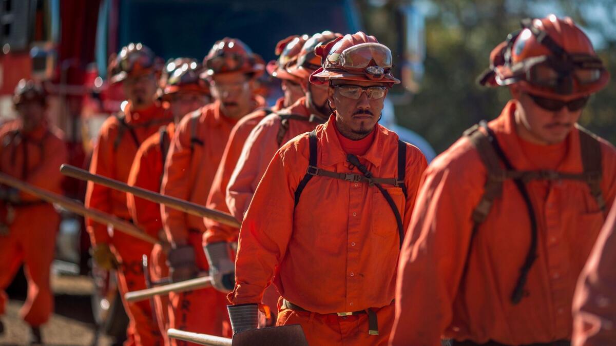 Prisoners at Oak Glen Conservation Camp line up for work deployment under the authority of Cal Fire near Yucaipa in 2017.