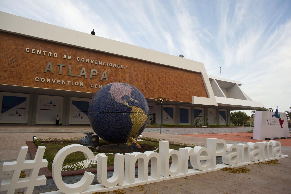 A national police officer stands guard on the rooftop of the Atlapa Convention Center in Panama City, Panama. The center is the site of this week's Summit of the Americas, the first that Cuba will attend.