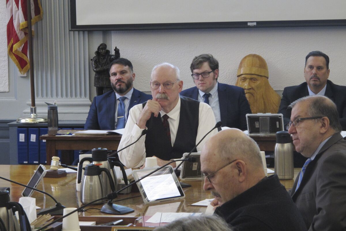 Alaska state Sen. Bert Stedman, center, a co-chair of the Senate Finance Committee, listens to a presentation on the major North Slope oil project known as the Willow project on Thursday, March 23, 2023, in Juneau, Alaska. The committee heard an update on the project from the state Department of Natural Resources and the state Department of Revenue. (AP Photo/Becky Bohrer)