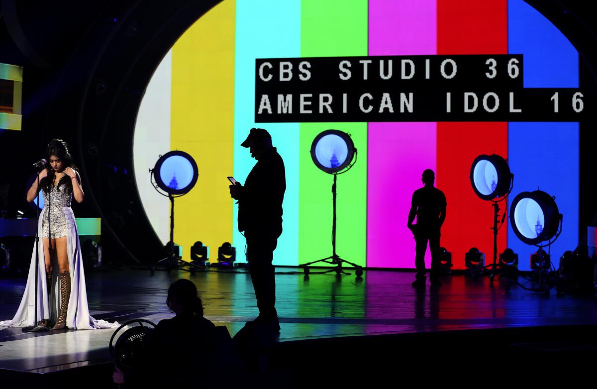 Contestant Sonika Vaid gets ready to perform during a dress rehearsal for the March 24 episode of "American Idol" in Hollywood. This is the last year of the landmark series.