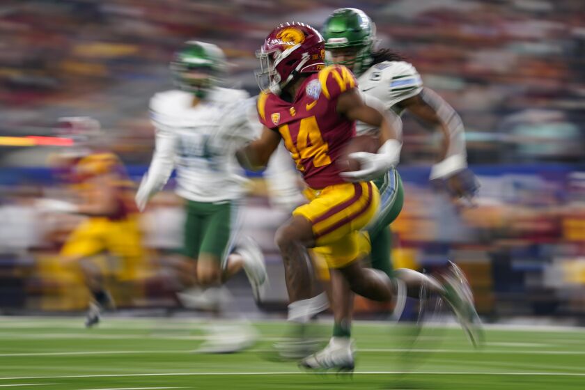Southern California running back Raleek Brown (14) runs with the ball during the second half of the Cotton Bowl 