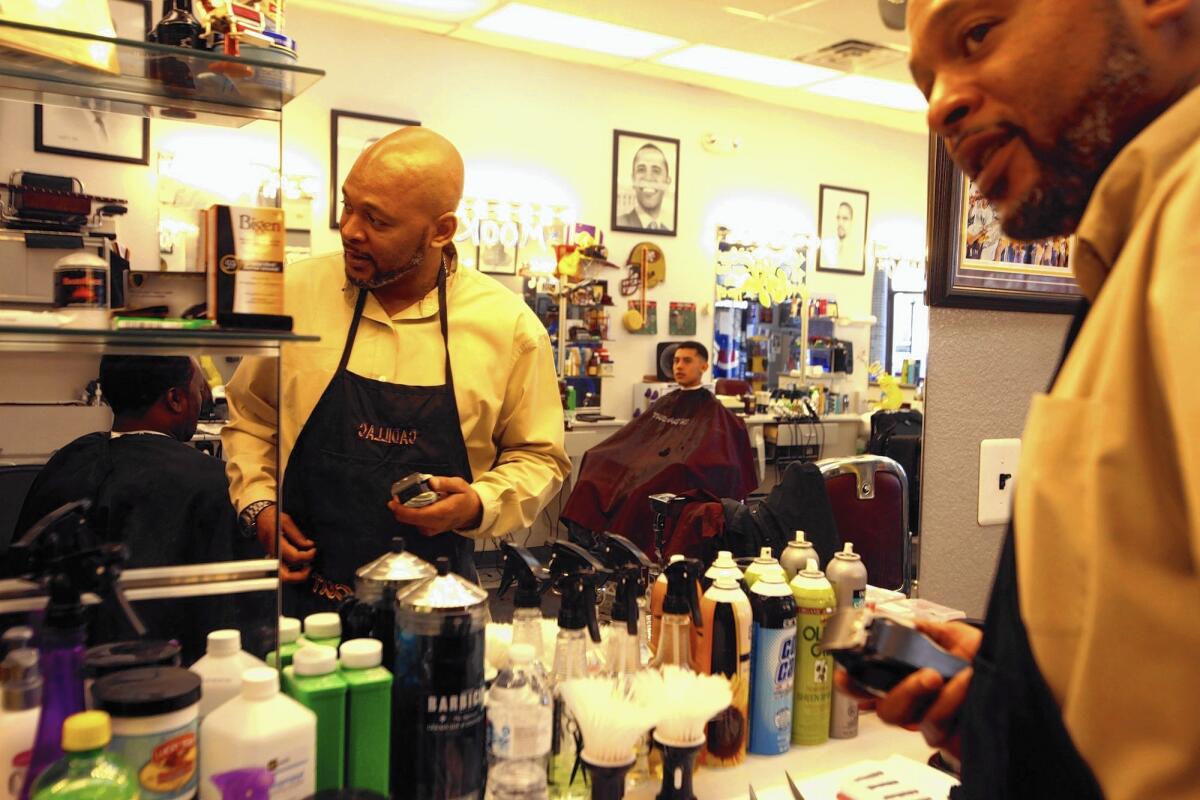 Cornelius “Cadillac” Burse now uses his skills as a barber at In Da Cut in Henderson, Nev.