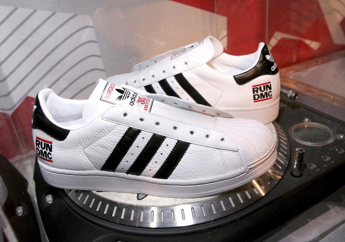 Run-DMC Adidas during the 35th anniversary of the Adidas superstar sneaker honoring the life of Jason "Jam Master Jay" Mizell at Skylight Studios in New York on Feb. 25, 2005. (Paul Hawthorne / Getty Images)