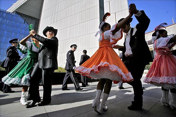 Folk dancers rehearse before the ceremony. The as-yet-unnamed police headquarters will replace Parker Center, which was built in 1955.