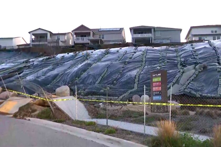 Six homes in Santa Clarita were evacuated after they were damaged by a collapsing hill in a residential development, authorities said.