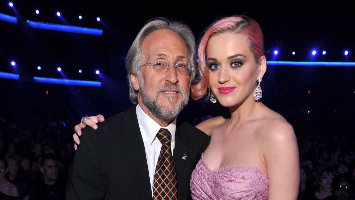 Grammy Awards' honcho Neil Portnow poses with Katy Perry.