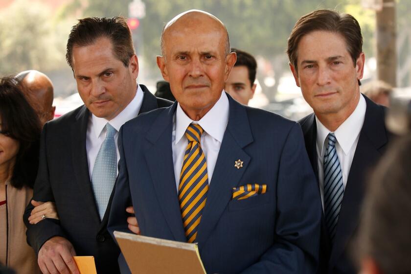 LOS ANGELES, CA - MAY 12, 2017 - Former Los Angeles County sheriff Lee Baca with his wife Carol Chiang and attorney's departs the U.S. Courthouse in Los Angeles on Friday May 12, 2017, after he is sentenced to three years in prison, marking an end to a corruption scandal that has roiled the Los Angeles County Sheriffâs Department for several years. Baca was found guilty of obstruction of justice, conspiracy and making false statements in connection with an effort to obstruct an FBI probe into corruption and brutality by jail deputies. (Al Seib / Los Angeles Times)