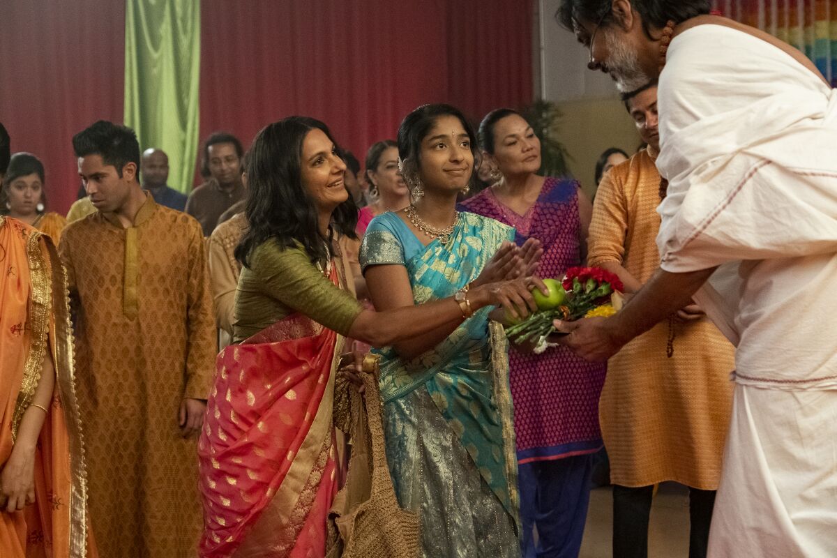 Poorna Jagannathan and Maitreyi Ramakrishnan in a scene from "Never Have I Ever."