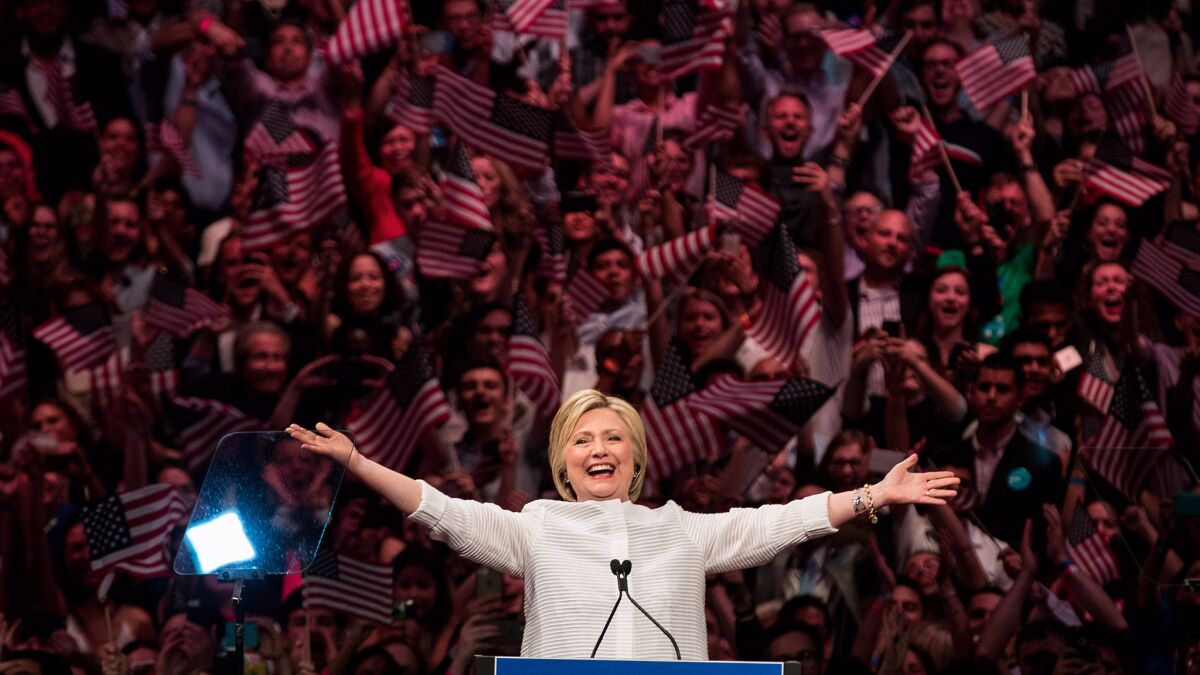 Hillary Clinton celebrates on Tuesday night.