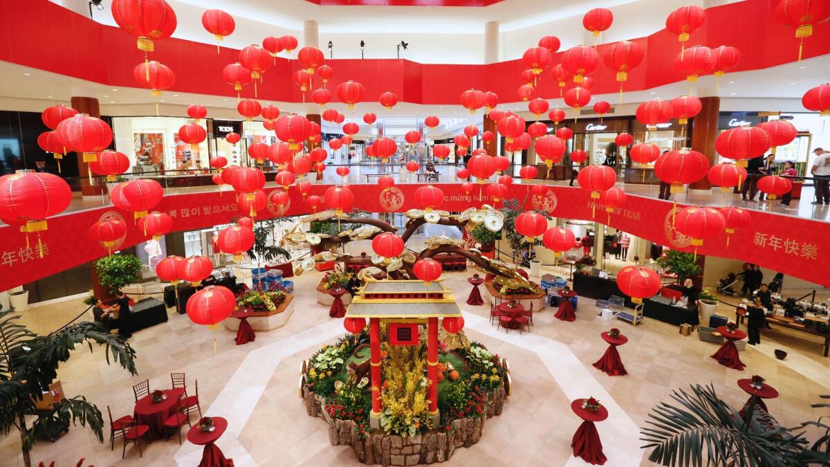 South Coast Plaza in Costa Mesa is decorated to celebrate the Year of the Monkey in February 2016. The center plans to mark the Year of the Fire Rooster.