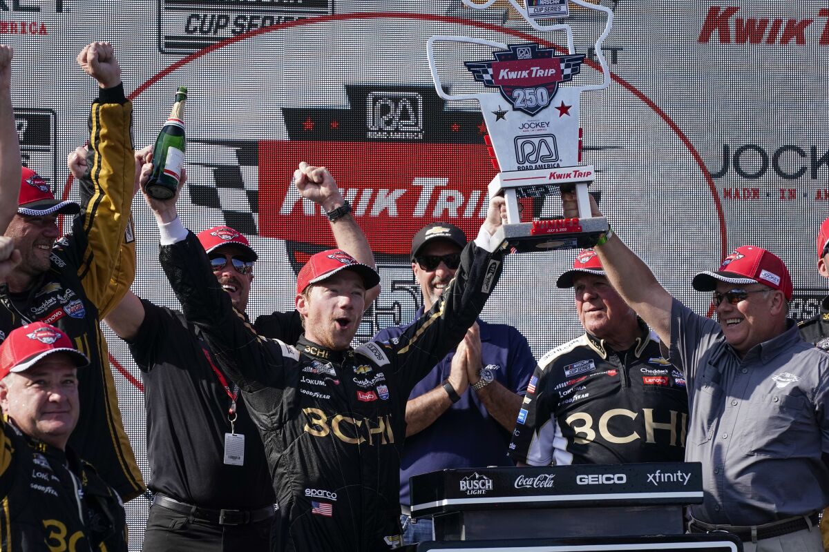 Tyler Reddick reacts after winning the Kwik Trip 250 after a NASCAR Cup Series race.