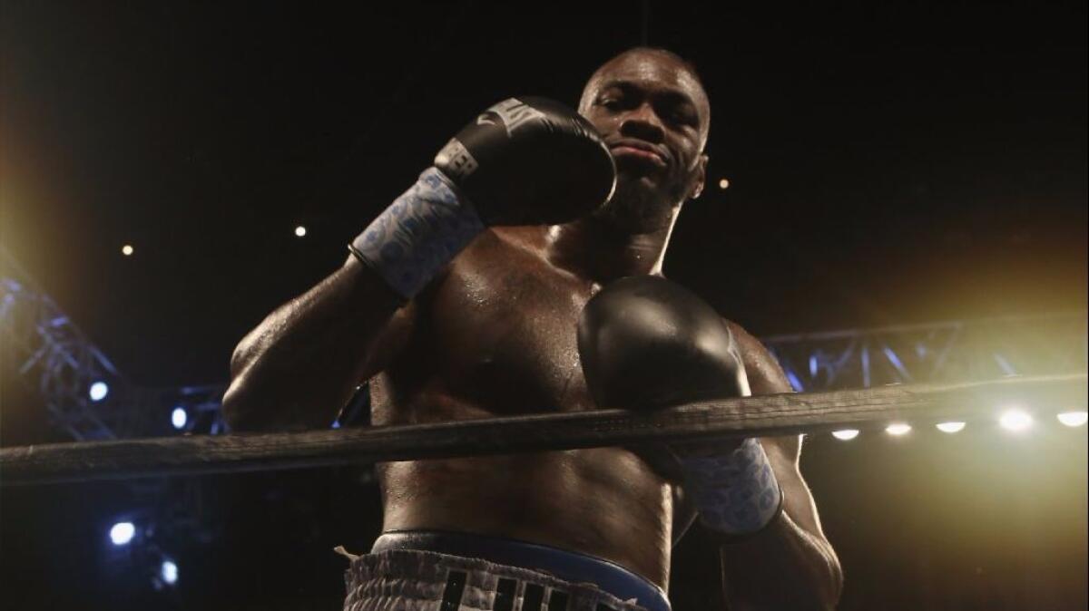 Deontay Wilder celebrates after knocking out Gerald Washington in the fifth round of their fight on Feb. 25 in Birmingham, Ala.