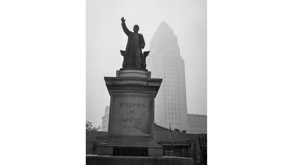 Sep. 13, 1955: White's statue on the Hall of Records lawn, with City Hall a short block away, dimly seen during dense smog. This photo was published in the Sept. 14, 1955, Los Angeles Times.