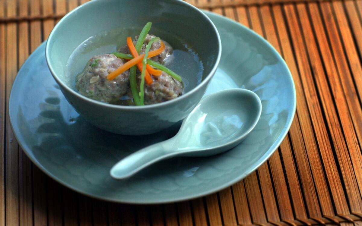 Chinese-style pork meatballs in broth
