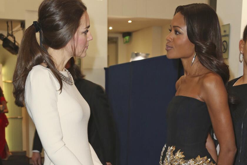 Britain's Catherine, Duchess of Cambridge, speaks to actress Naomie Harris during the British premiere of "Mandela: Long Walk to Freedom" on Thursday. Harris plays Winnie Mandela in the film.
