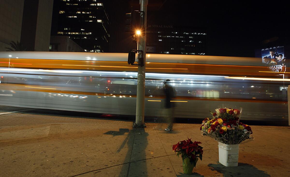 At the densely packed intersection of Wilshire Boulevard and Vermont Avenue stands the Metro Red Line Station.