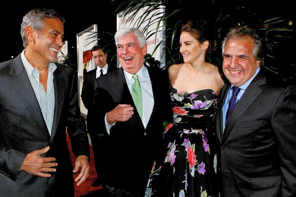 From left, George Clooney, MPAA chairman Chris Dodd, actress Shailene Woodley and Fox Filmed entertainment chairman Jim Gianopulos arrive at the Los Angeles premiere of "The Descendants" in 2011.