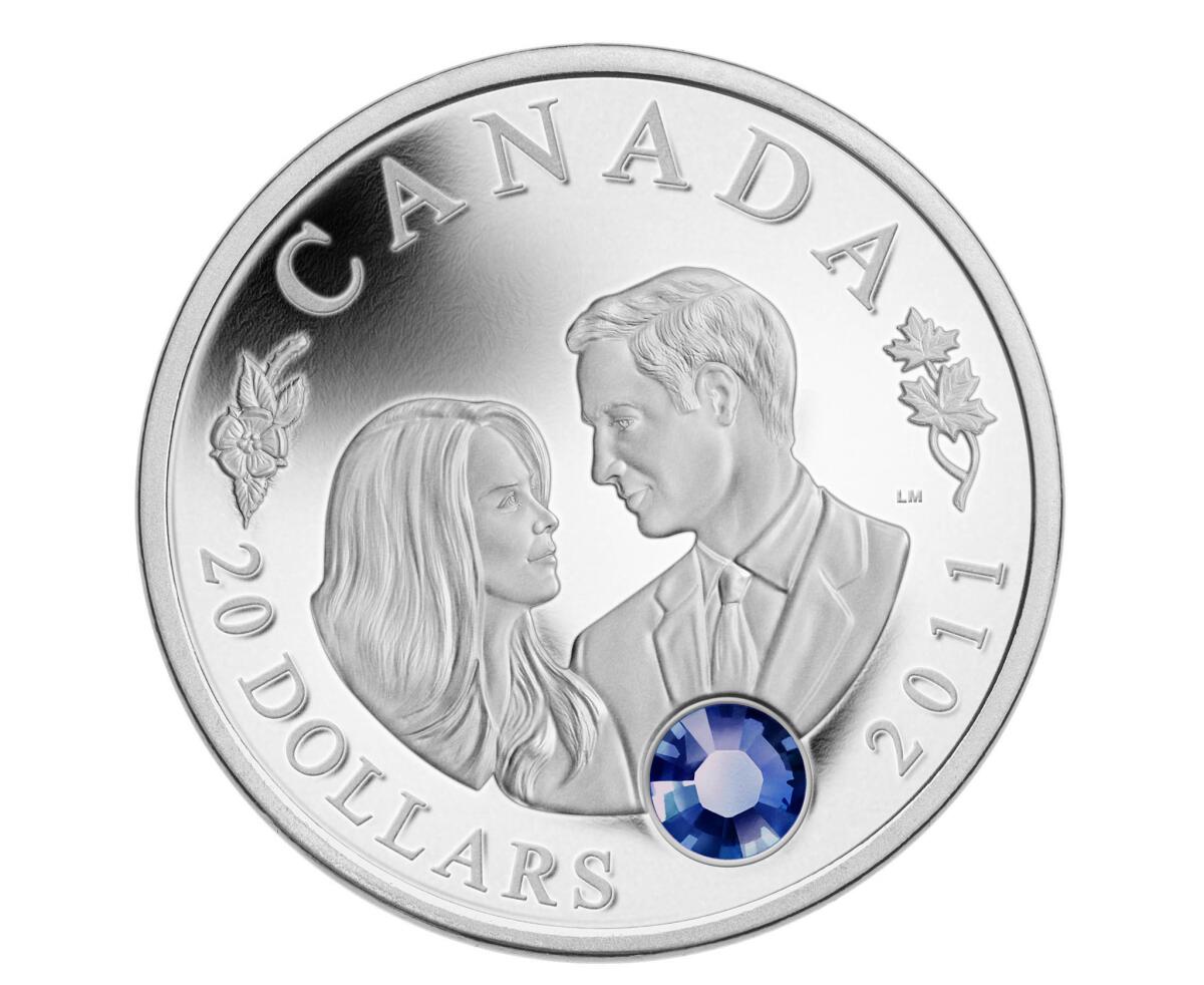 April 11, 2011: A collectors' coin features a sapphire-colored crystal inlay to symbolize Kate Middleton's engagement ring.