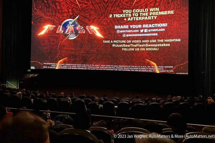 The audience eagerly awaiting the advance screening of THE FLASH.