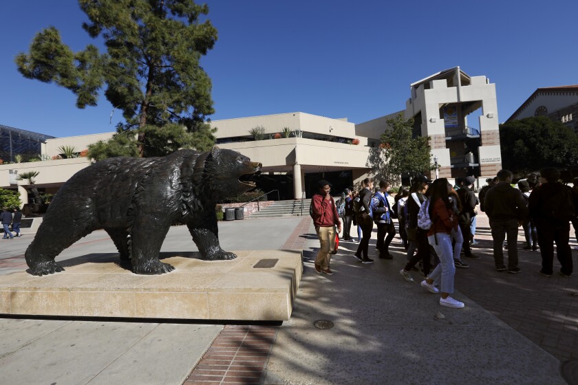 Students visit the UCLA campus in Westwood on March 13, 2019.