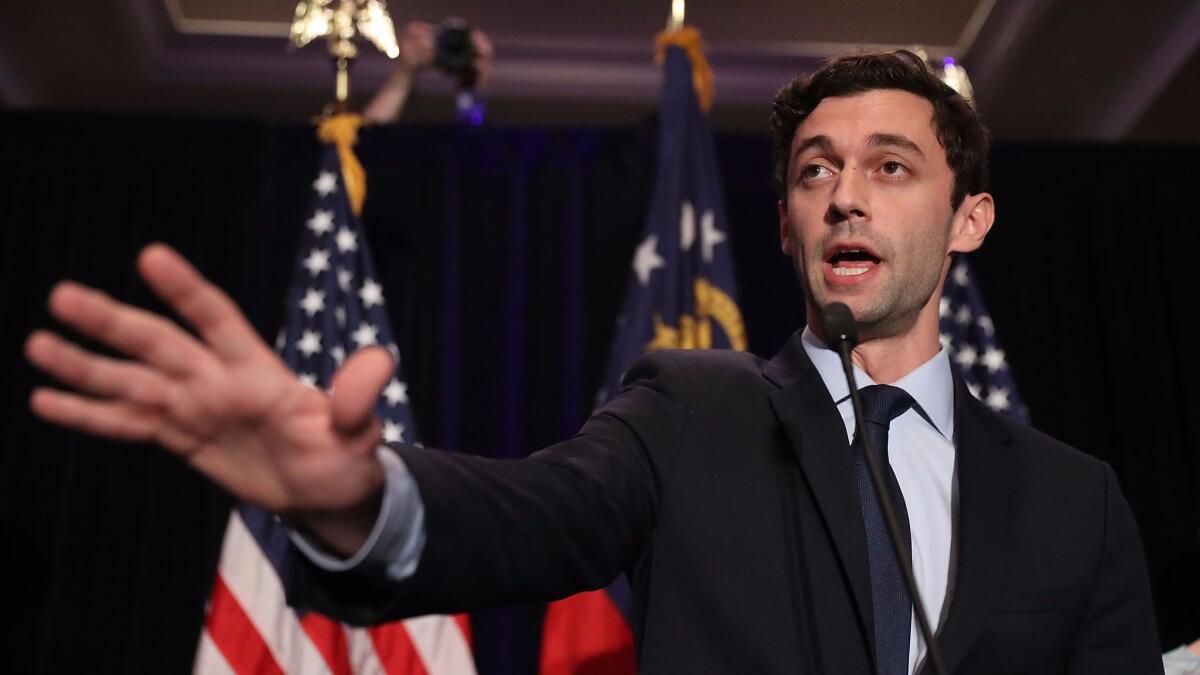 Jon Ossoff delivers a concession speech during his election night party.
