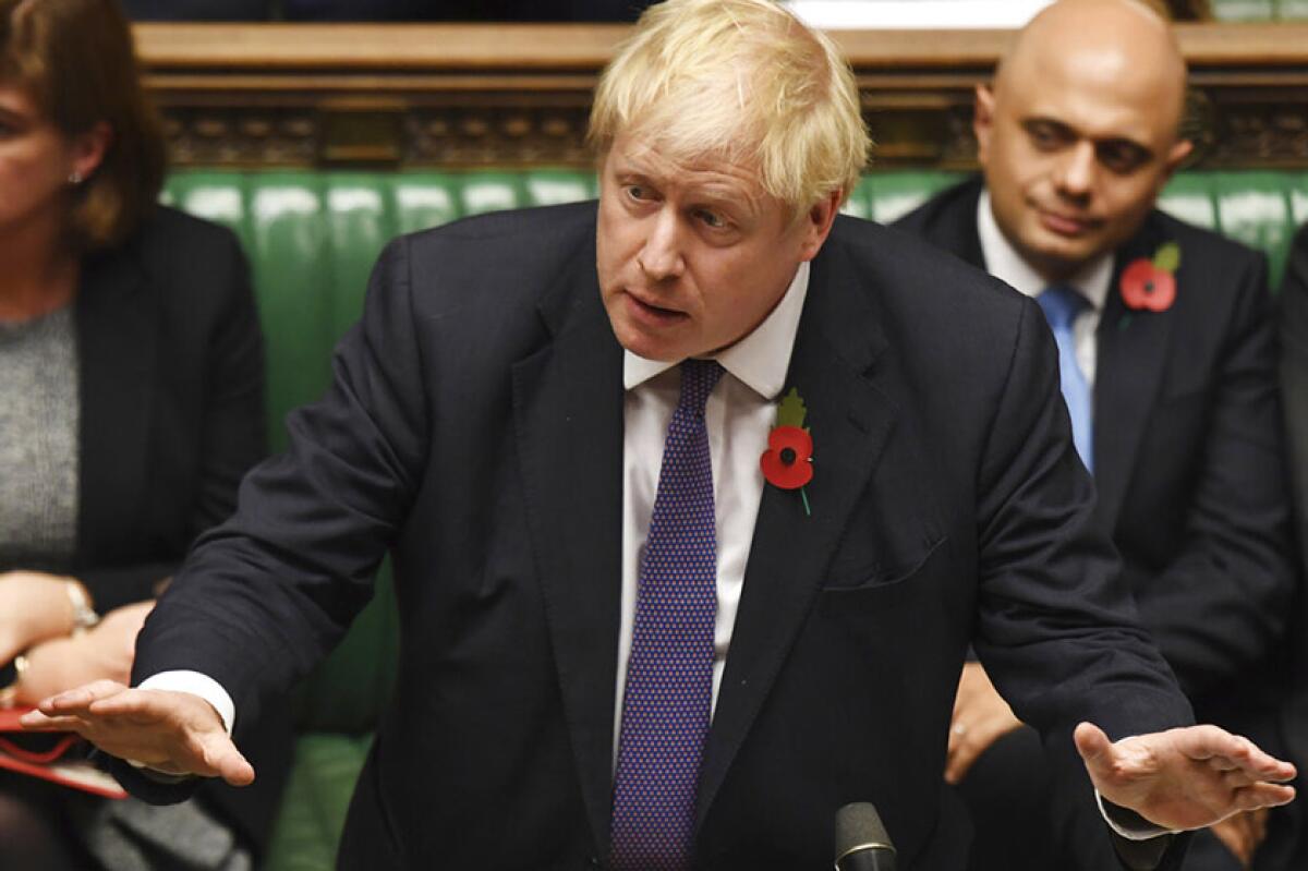 British Prime Minister Boris Johnson speaks to lawmakers during an election debate in the House of Commons in London on Nov. 11, 2019.
