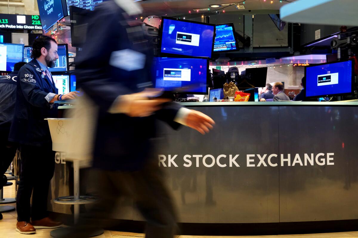 Traders work the New York Stock Exchange floor