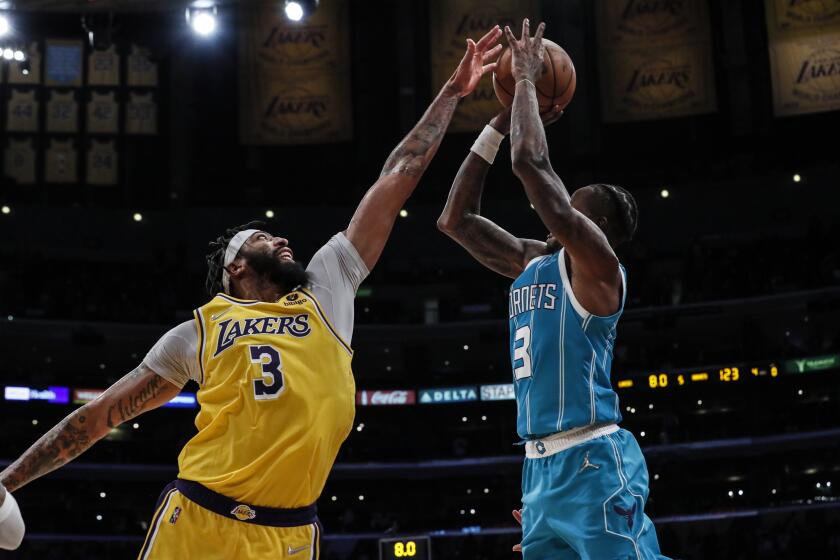 Los Angeles, CA, Monday, November 8, 2021 -Los Angeles Lakers forward Anthony Davis (3) contest.