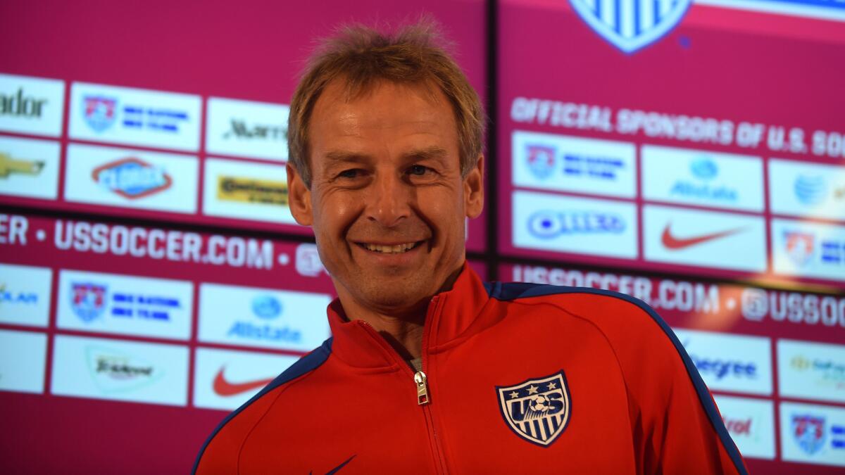 U.S. national soccer team Coach Juergen Klinsmann smiles during a news conference in Sao Paulo, Brazil, on Tuesday. Klinsmann, who won the World Cup while playing for West Germany in 1990, is looking forward to Thursday's Group G showdown with Germany.