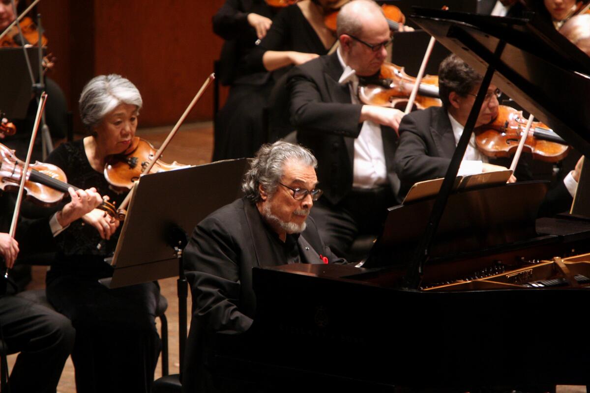 Leon Fleisher performs with members of the New York Philharmonic.