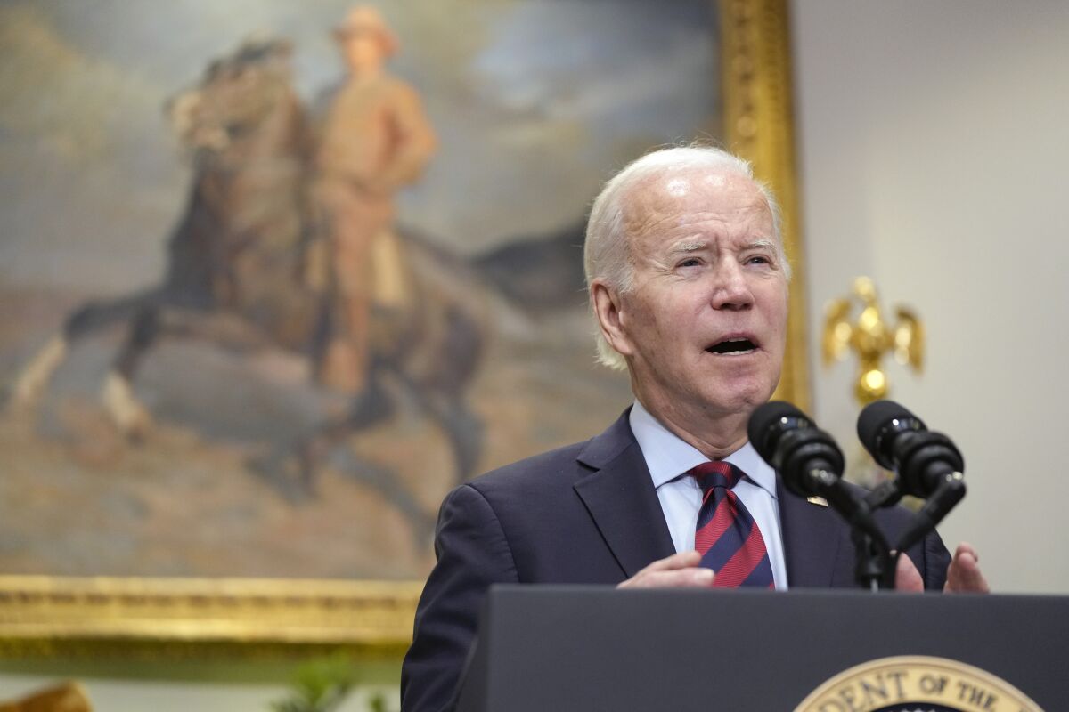 President Biden speaks before signing a bill to avert a railroad workers strike on Dec. 2. 