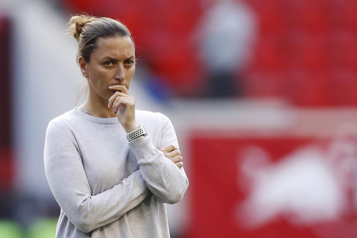 Gotham FC coach Freya Coombe watches warmups before an NWSL match 