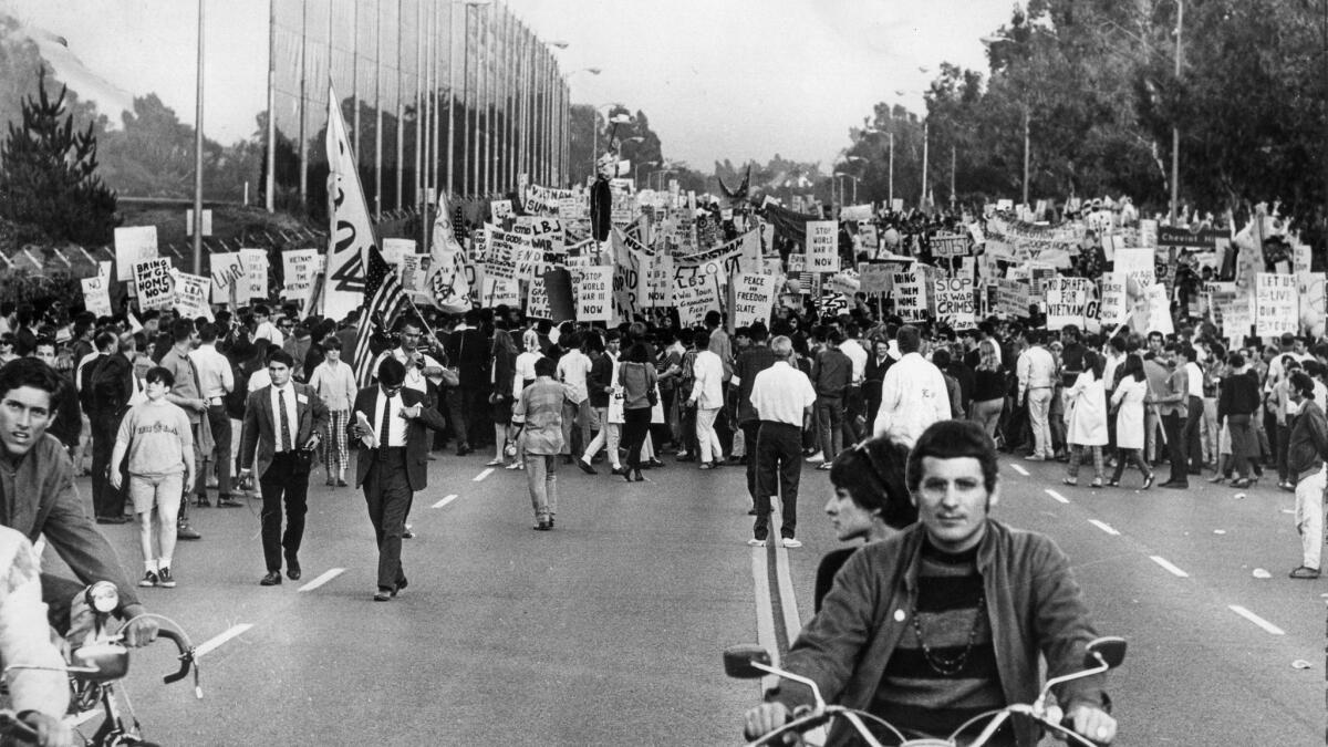 June 23, 1967: Protestors fill Motor Ave. as they start marching toward Century Plaza Hotel for an anti-Vietnam War protest. Ten thousand protesters turned out during speech by President Lyndon Johnson.