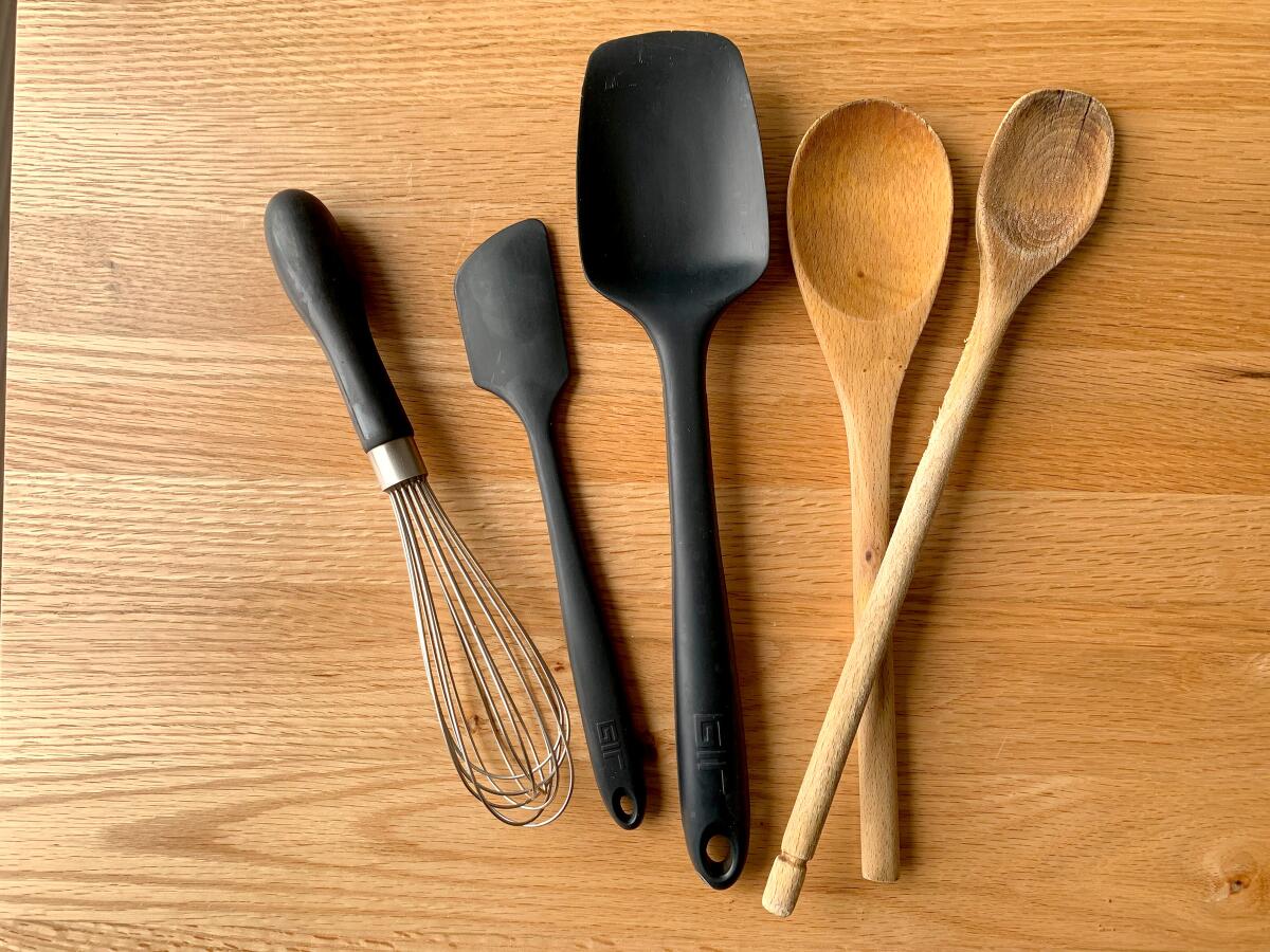Whisks, silicone spatulas and wooden spoons.
