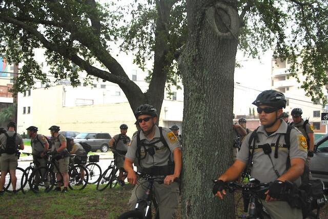 Tampa police keep an eye on things across the street from the Occupy RNC gathering on Aug. 27, 2012.