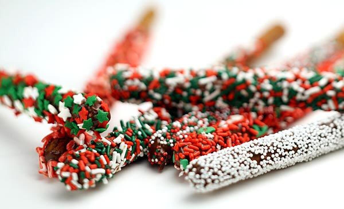 With adult supervision, kids can make chocolate-covered pretzels.