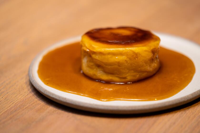 LOS ANGELES, CA - MARCH 14: Pastry Chef Dyan Ng makes a pan roasted honey butter Brioche in the kitchen at Auburn on Saturday, March 14, 2020 in Los Angeles, CA. (Kent Nishimura / Los Angeles Times)