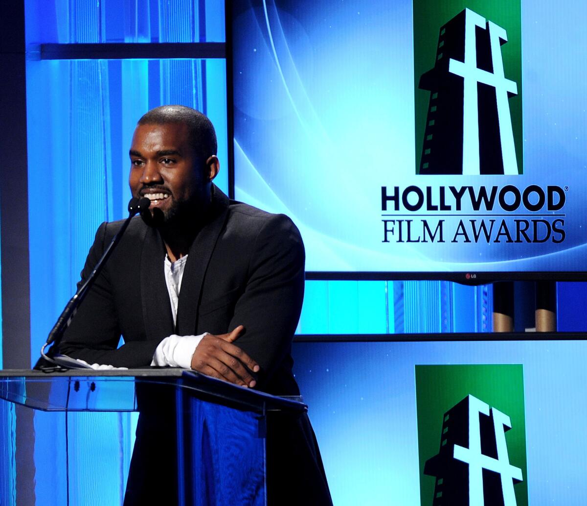 Rapper Kanye West, shown in 2013 at the Hollywood Film Awards, is working on a new album, which some have rumored will be a spoken-word project.
