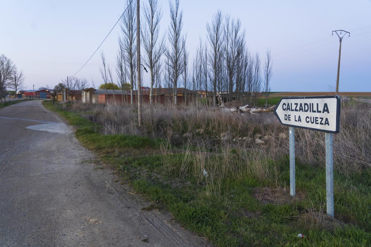 A sign points the way to Calzadilla de la Cueza, a rural Spanish town with 50 residents.