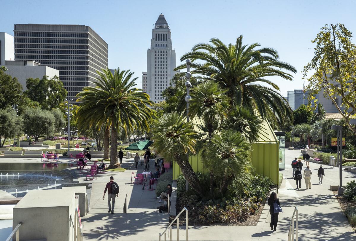 City Hall rises in the background above Grand Park in downtown Los Angeles.