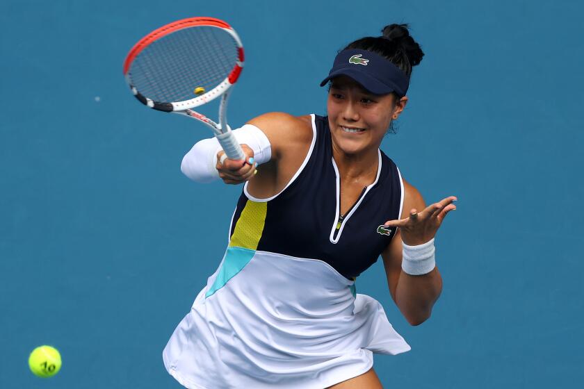 MELBOURNE, AUSTRALIA - JANUARY 20: Kristie Ahn of the United States of America plays a forehand during her Women's Singles first round match against Caroline Wozniacki of Denmark on day one of the 2020 Australian Open at Melbourne Park on January 20, 2020 in Melbourne, Australia. (Photo by Clive Brunskill/Getty Images)