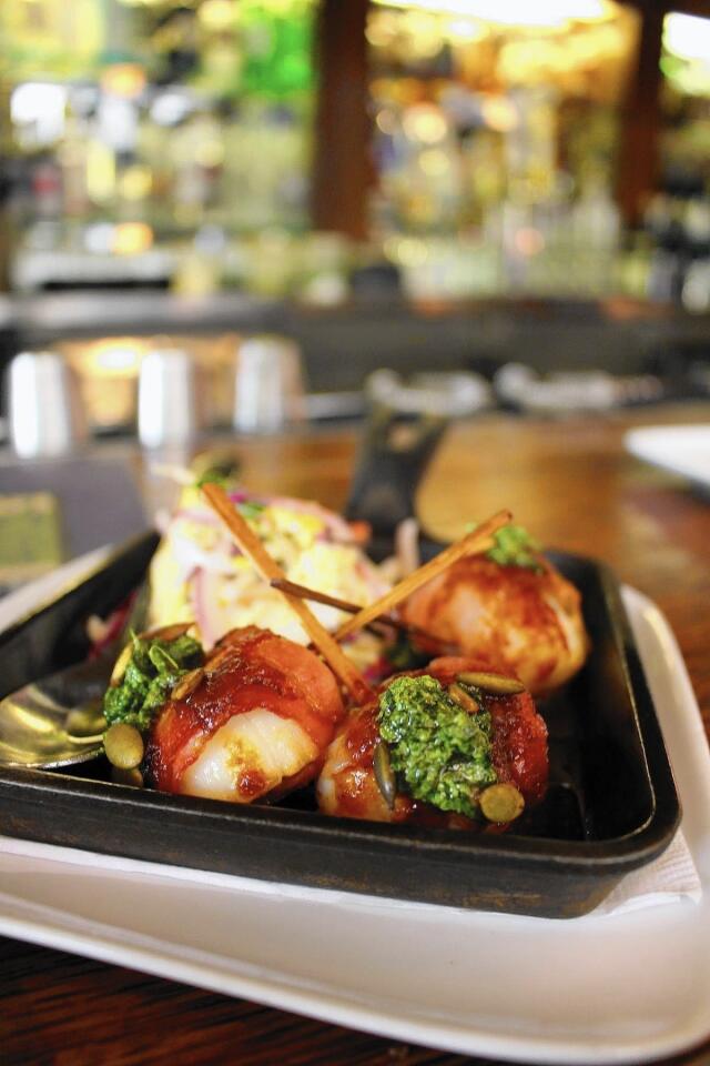 Bacon-wrapped scallops are a favorite at Willi's Seafood and Raw Bar in Healdsburg, Calif.