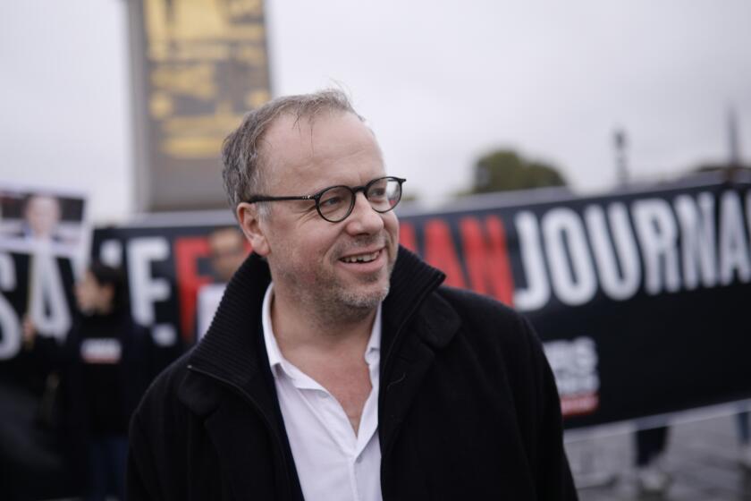 FILE - French watchdog Reporters without Borders general secretary Christophe Deloire attends a demonstration in Paris, Tuesday Oct.24, 2017. Deloire, who negotiated to free imprisoned journalists and offered refuge to reporters under threat around the world, died Saturday, June 8, 2024, at 53. (AP Photo/Kamil Zihnioglu, File)