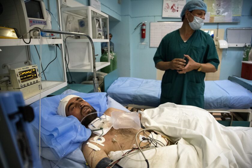 A soldier underwent treatment in May in the intensive-care unit of the National Military Hospital in Kabul, Afghanistan.