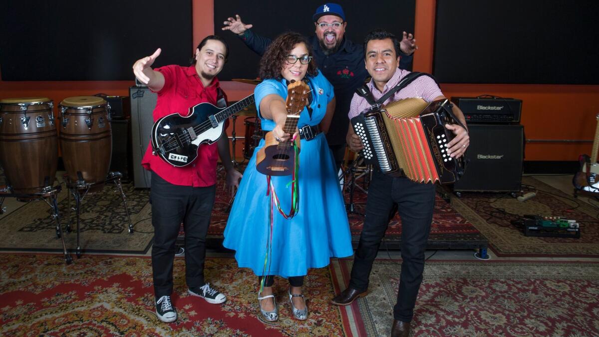 La Santa Cecilia. From left: Bassist Alex Bendana, vocalist La Marisoul, drummer Miguel Ramirez and accordionist Jose Carlos.