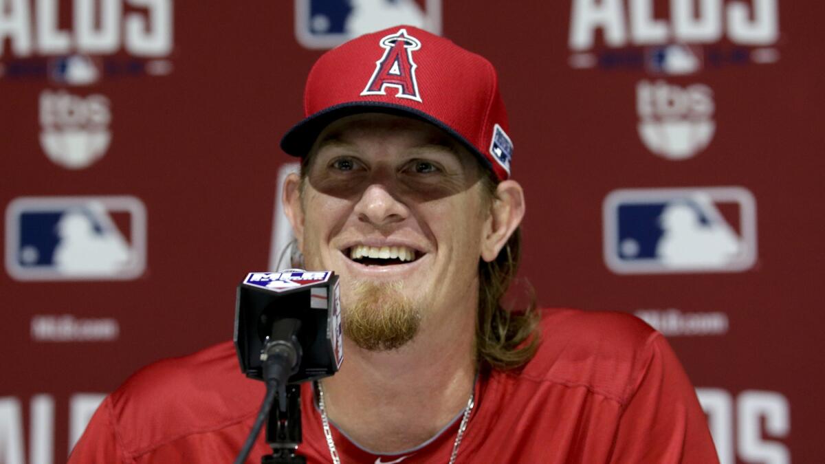 Angels starter Jered Weaver speaks during a news conference on Wednesday.