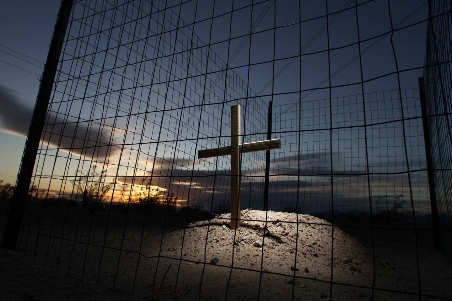 A cross marks the site where ancient human remains were found near the transmission line corridor for the $1-billion Genesis solar project 200 miles east of Los Angeles.