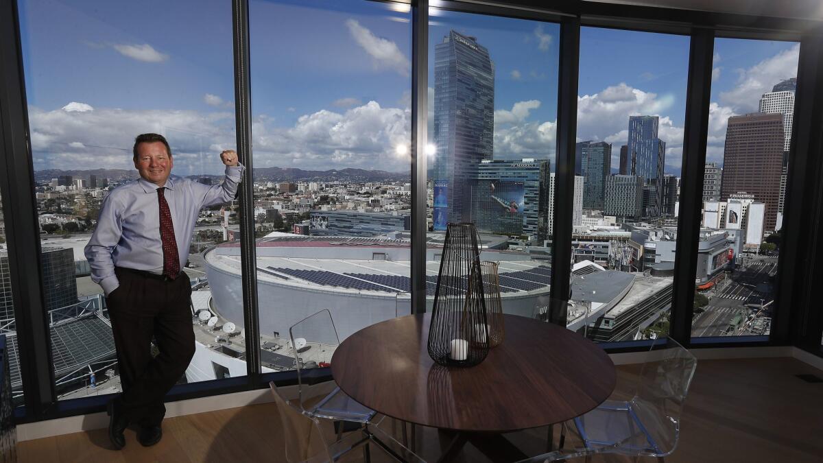 Scott Dobbins, president of Hankey Investment Co., in a two-bedroom suite on the 20th floor of the west tower at Circa apartment complex on Figueroa Street in downtown Los Angeles.